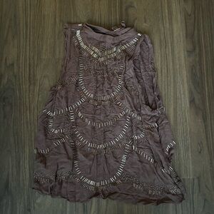 Backless Free People Tank Top. Beaded, high neck, and open back. Never worn.